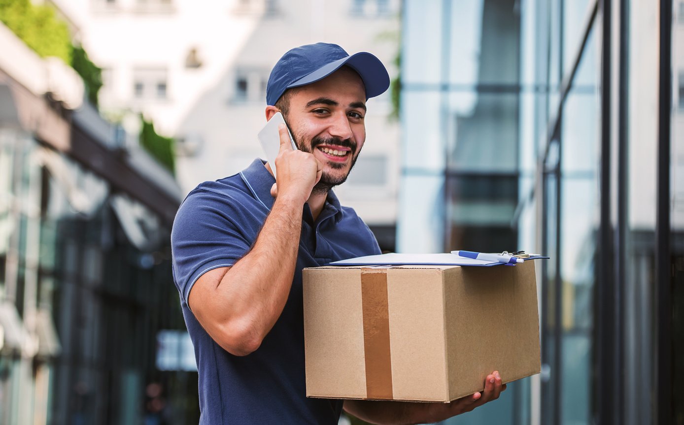 On time. Courier delivering package